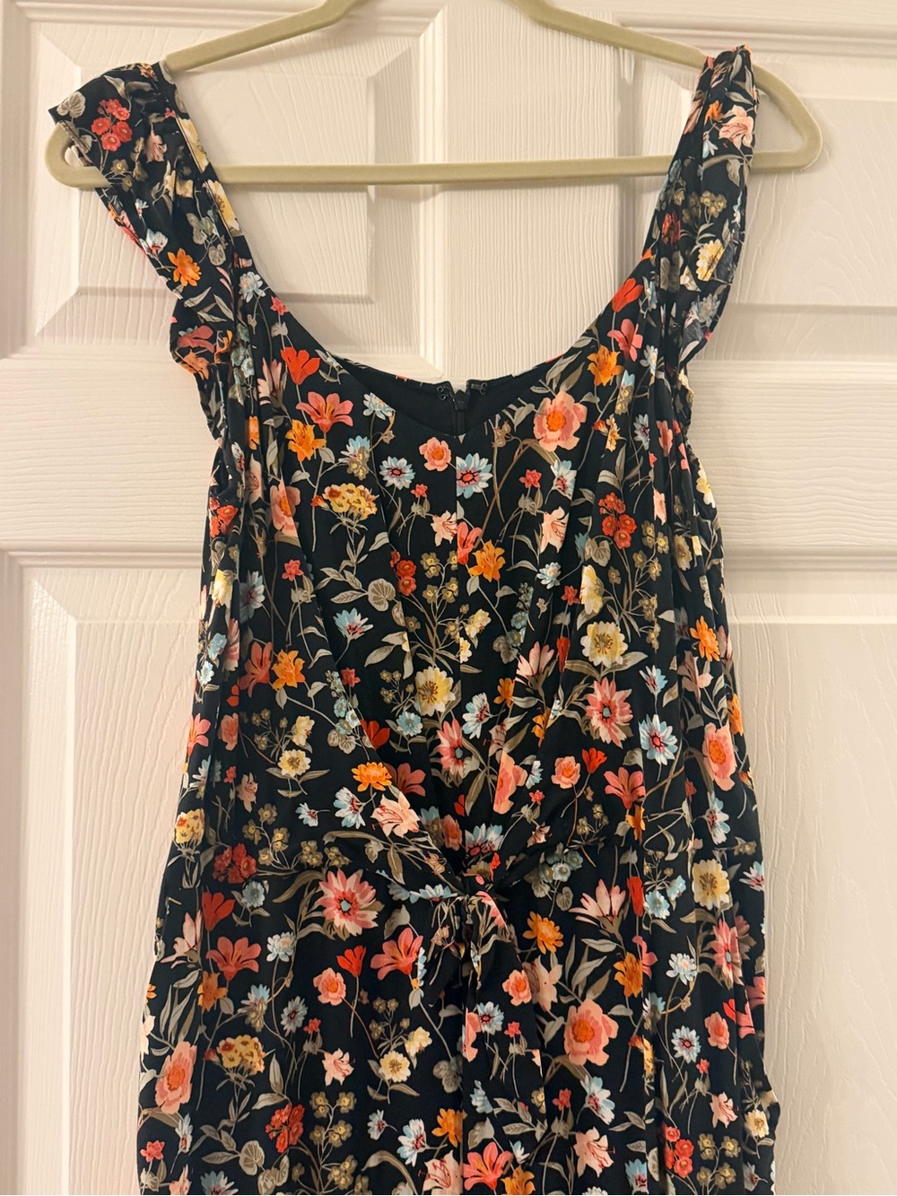 Floral Tie-Front Sleeveless jumpsuit. Black with Multicolor Floral Print